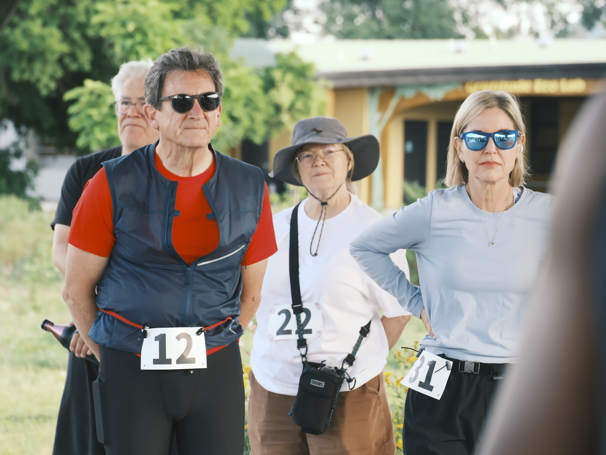 Participants listening together before the community run.